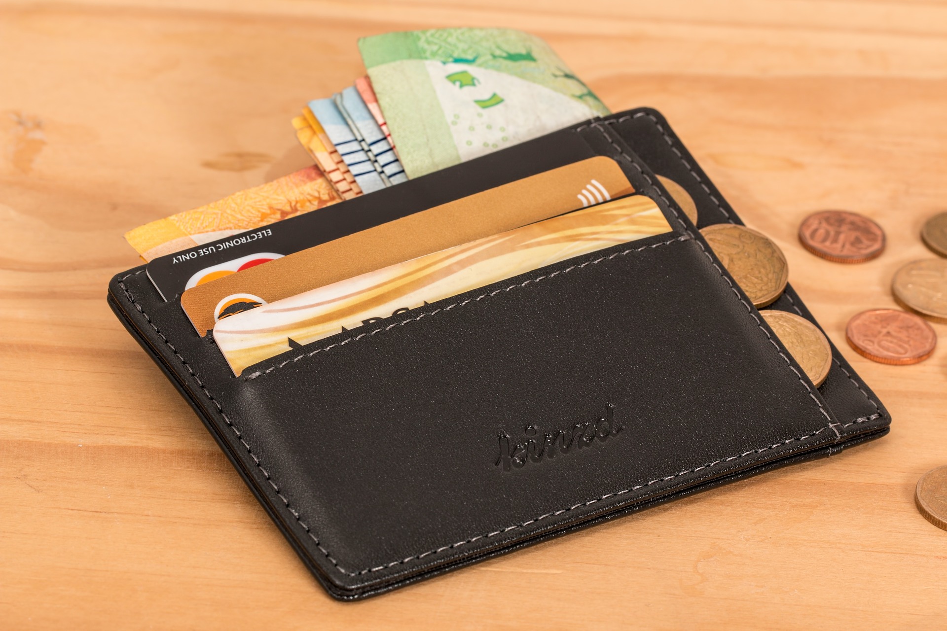 wallet with cards, coins and money